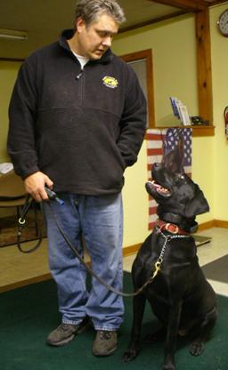 Rick Froton of Fortunate K9 with a boarding dog